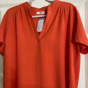Orange short sleeve blouse